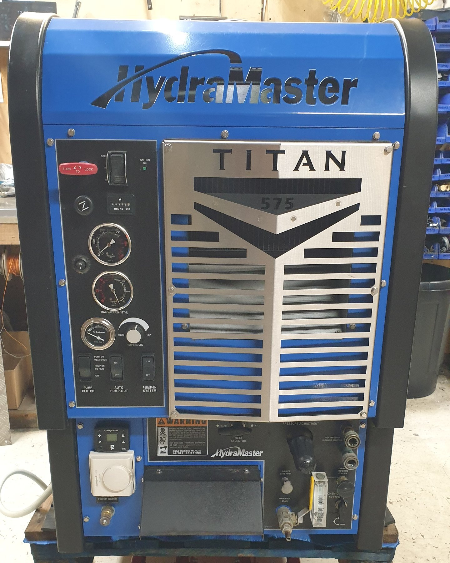 Used Titan 575 with waste tank, water tank and fuel tank